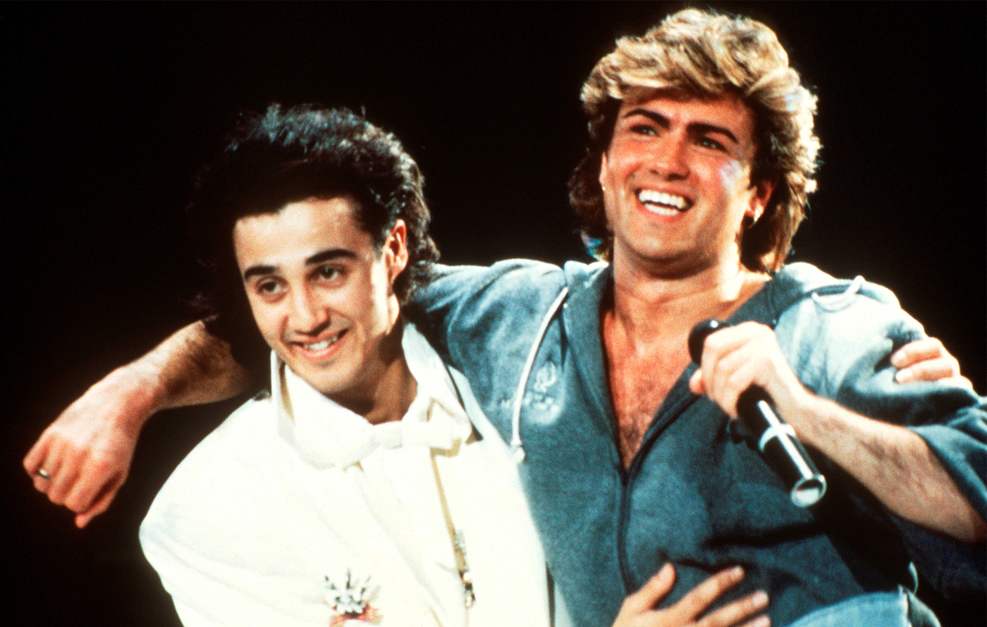 Andrew Ridgeley and George Michael of Wham! Credit: Michael Putland via Getty Images