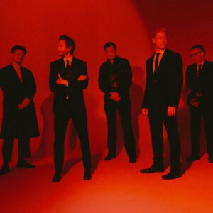 Regardez Interpol échanger leurs voix alors qu'ils lancent leur nouvelle chanson propulsive « See Out Loud »